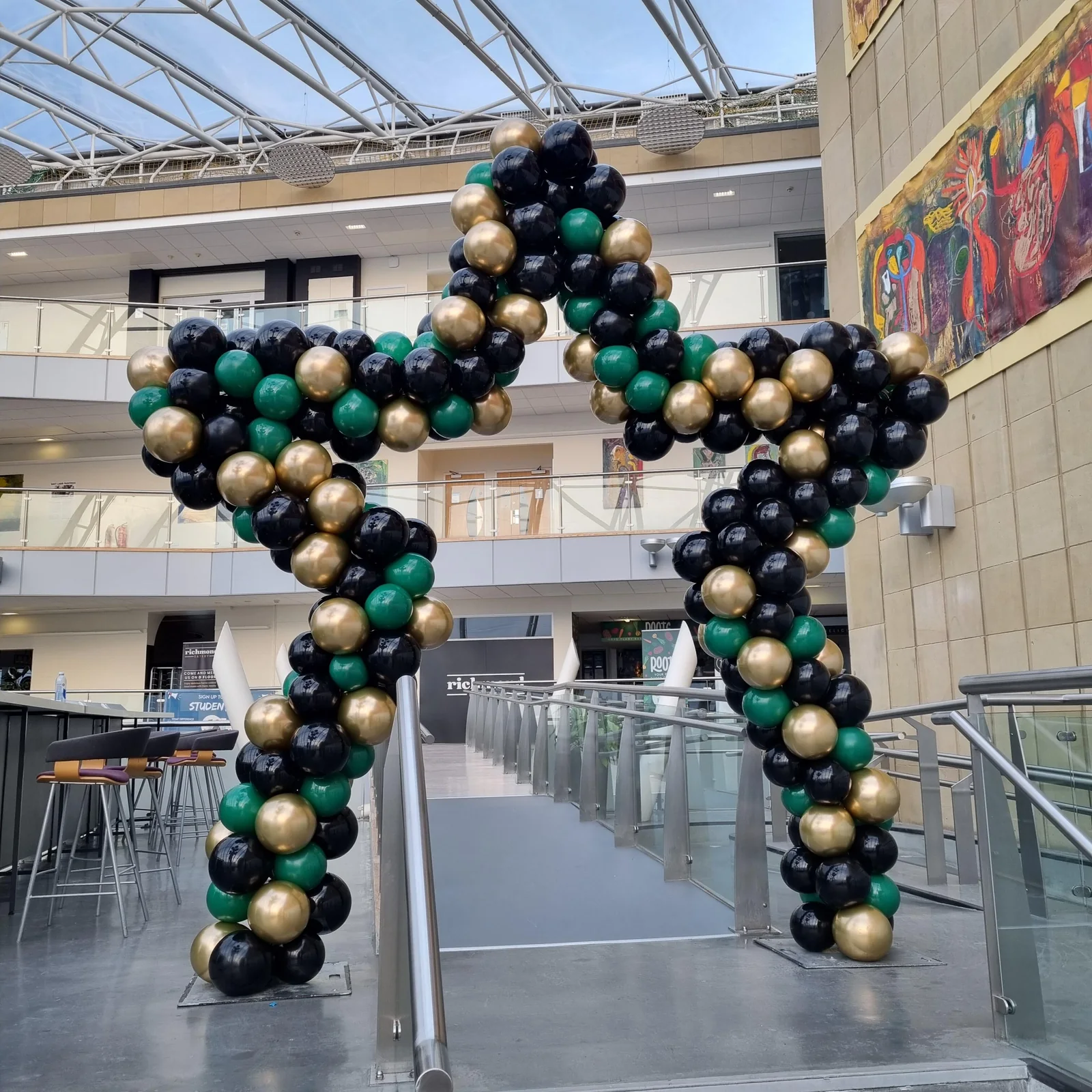 Huge balloon star arch with matching towers